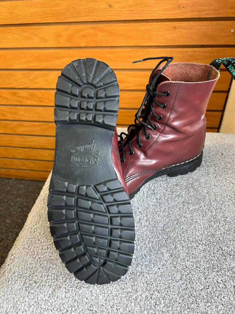 Close up view of Dr. Marten boots with new soles ready for everyday wear.