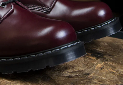 Dr. Marten boots resoled with smooth edged replacement soles.