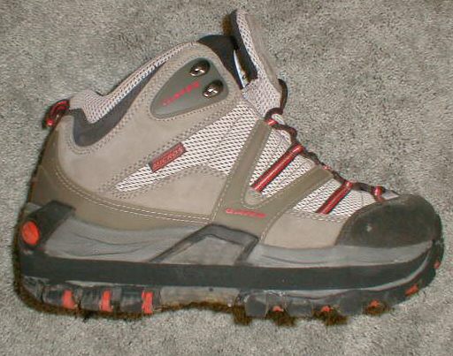 Hiking boot with a full-sole orthopedic shoe lift.